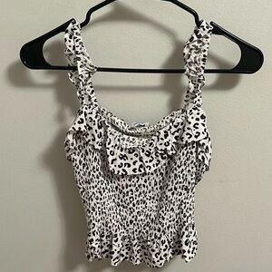 Olivaceous black and white cheetah smocked ruffle tank top